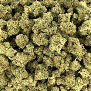 Close-up of OG Kush THCa Flower buds with frosty trichomes and vivid green hues.