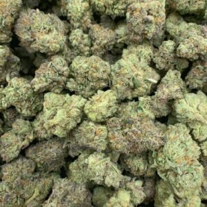 Close-up of dense Lemon Sorbet THCa Flower buds with vibrant lemon hues.