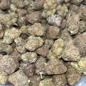 Sour Lemonade THCa Flower buds with vibrant yellow-green hues, orange pistils, and a thick coating of trichomes.